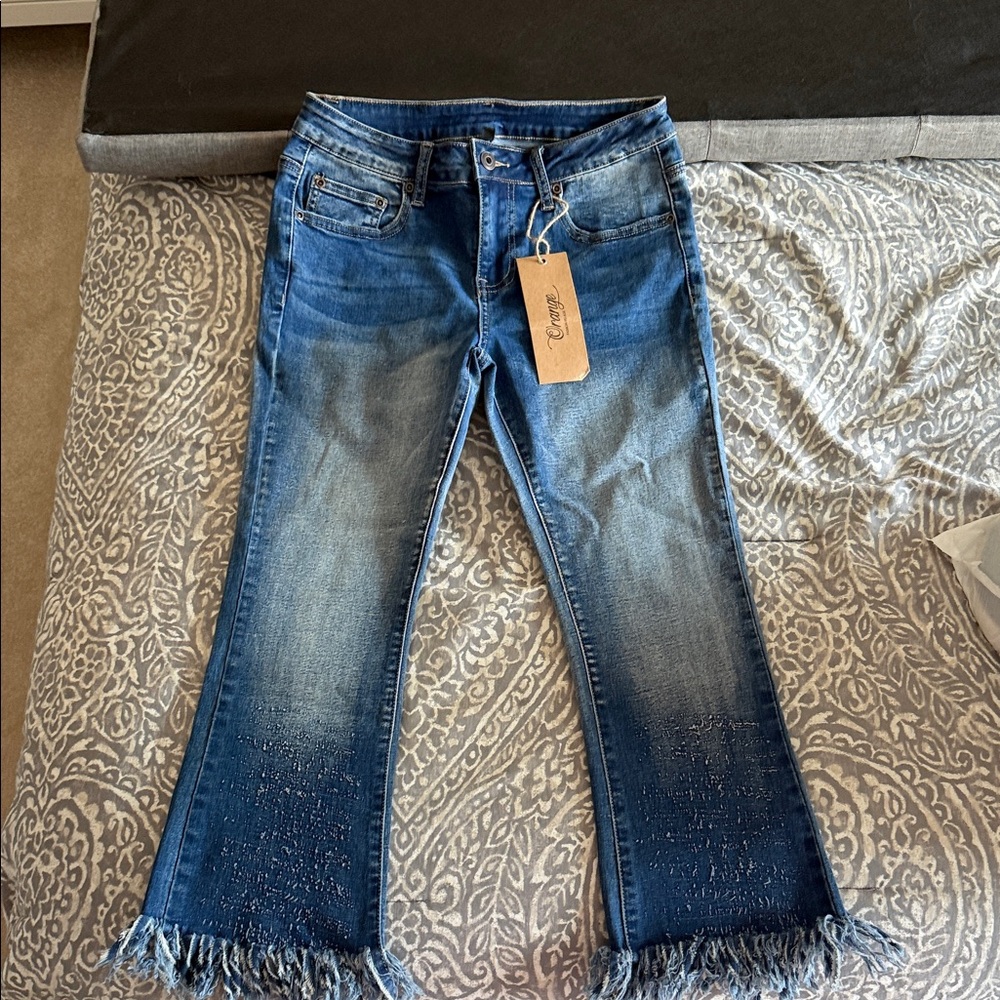 Stylish Blue Flare Jeans with Fringe Hem